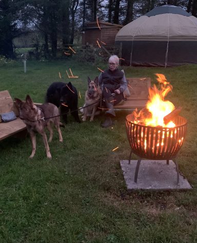 Relaxing by firepit